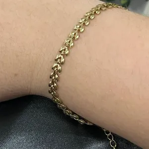Pulseira com folhinhas em aço dourado