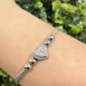 Pulseira com pingente coração
