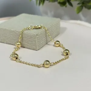 Pulseira elo português com esferas