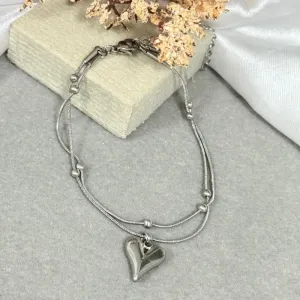 Pulseira de aço dupla com pingente coração