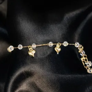 Pulseira com pedras e pingentes