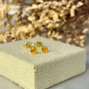 Brinco ponto de luz cor laranja