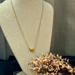 Colar fio de aço dourado com pingente