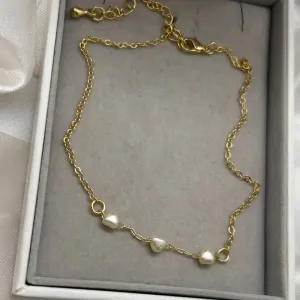 Tornozeleira pérolas coração