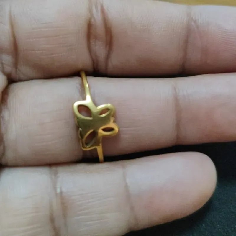 Anel borboleta de aço dourado