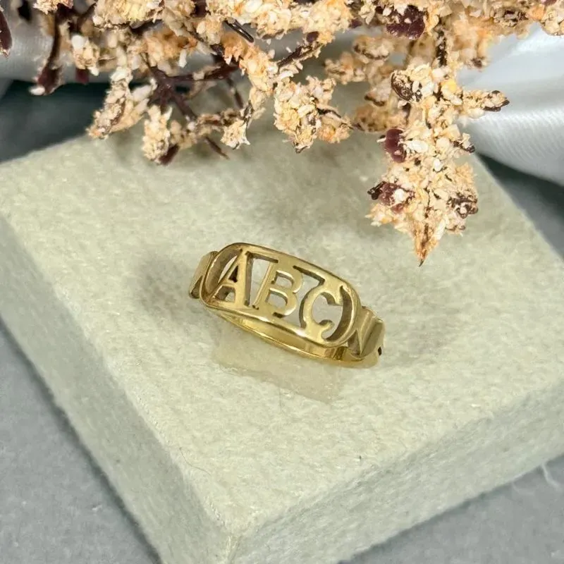 Anel ABC infantil de aço dourado