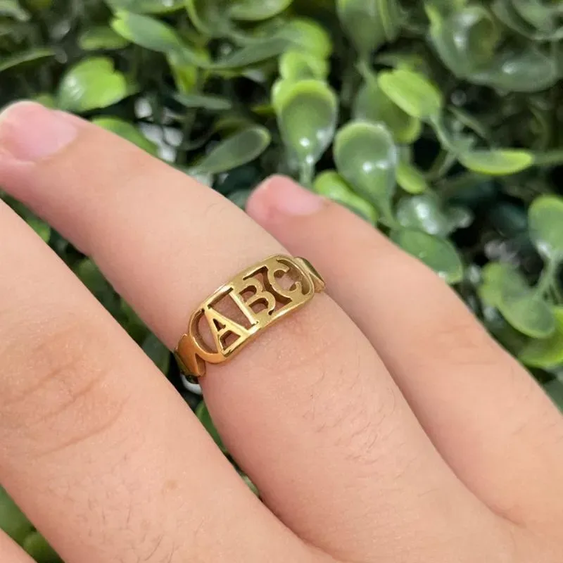 Anel ABC infantil de aço dourado