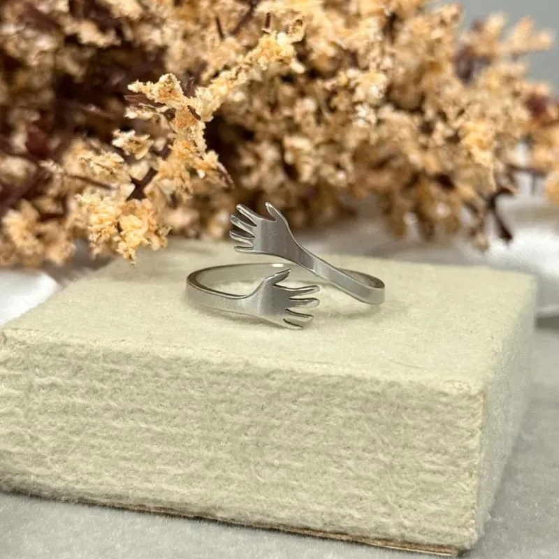 Anel do abraço em aço