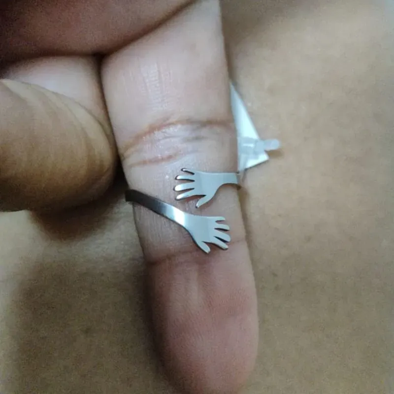 Anel do abraço em aço