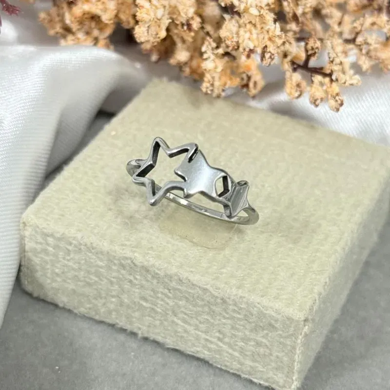 Anel três estrelas de aço