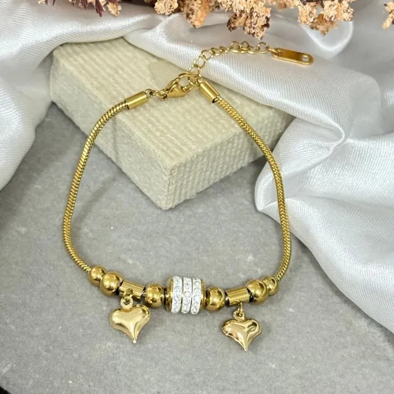 Pulseira de aço dourado com pingente
