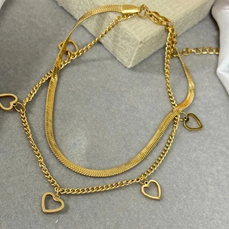 Tornozeleira dupla de aço com pingente coração vazado