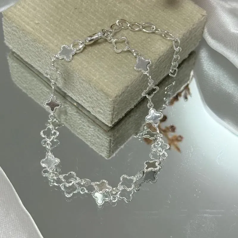 Pulseira infantil com pingente estrela