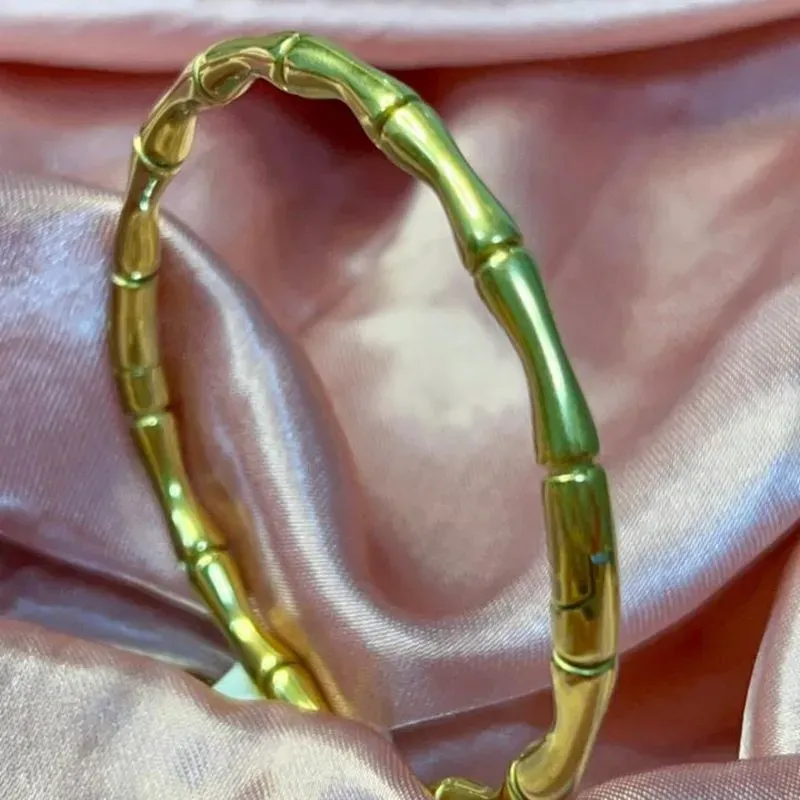 Bracelete de aço Dourado