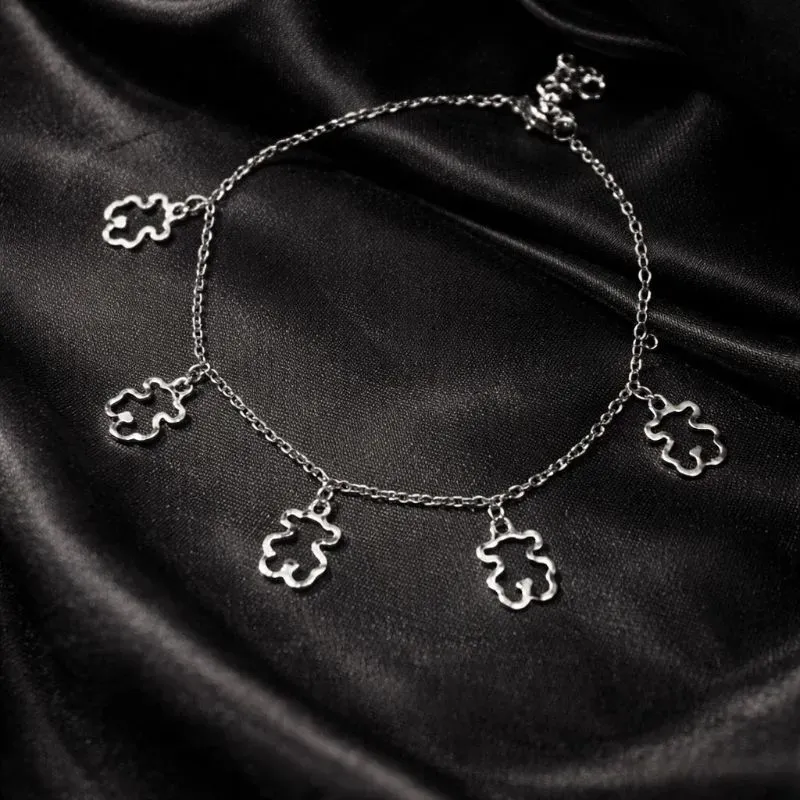 Tornozeleira com pingente vazado