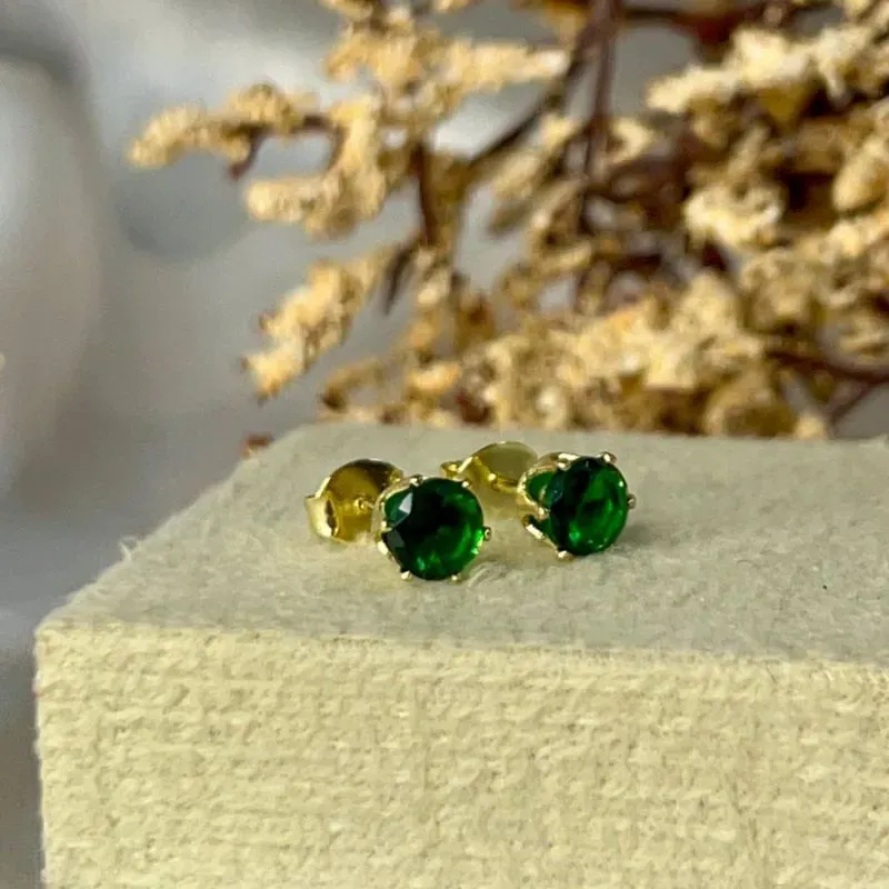 Brinco ponto de luz verde