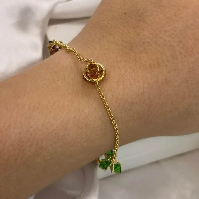 Pulseira com pedras coloridas