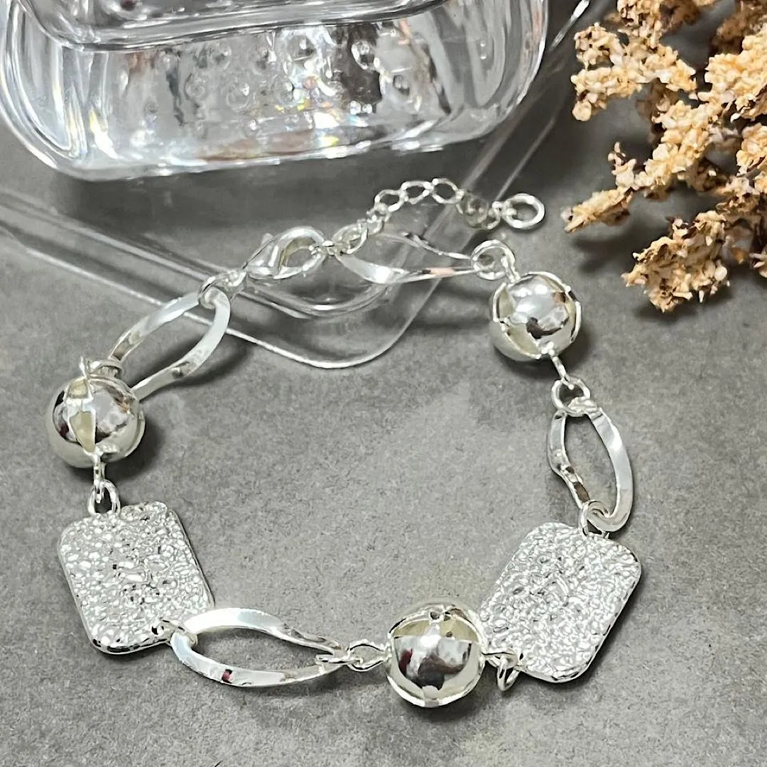 Pulseira esferas com chapinha