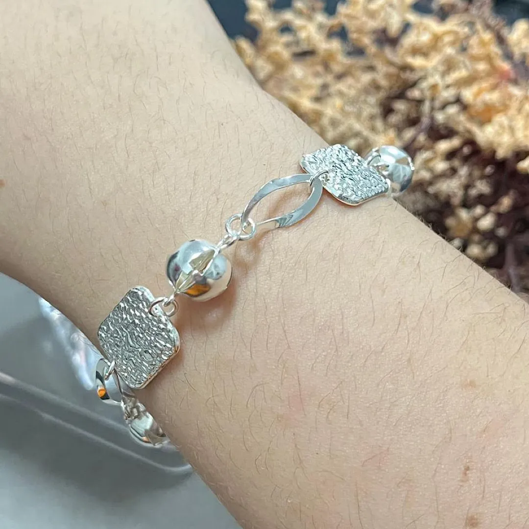 Pulseira esferas com chapinha