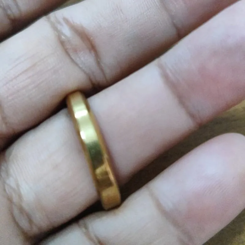 Aliança aço dourado