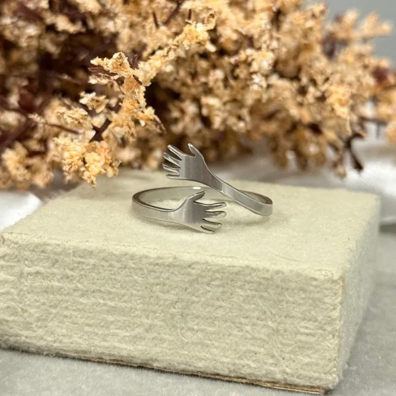 Anel do abraço em aço