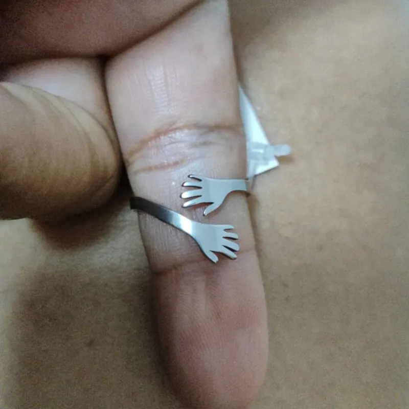 Anel do abraço em aço