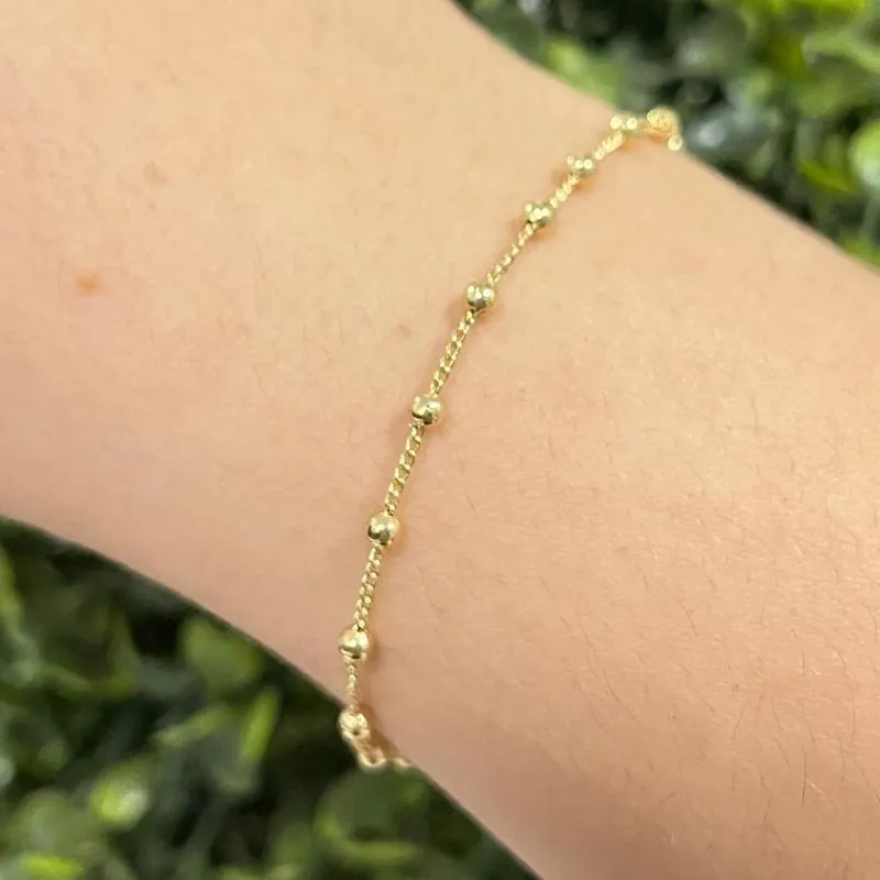 Pulseira com bolinhas