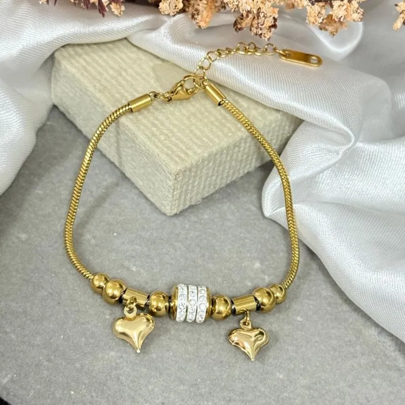 Pulseira de aço dourado com pingente