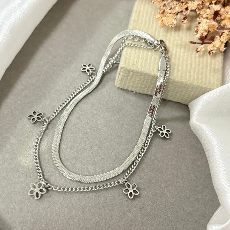 Tornozeleira dupla de aço com pingente