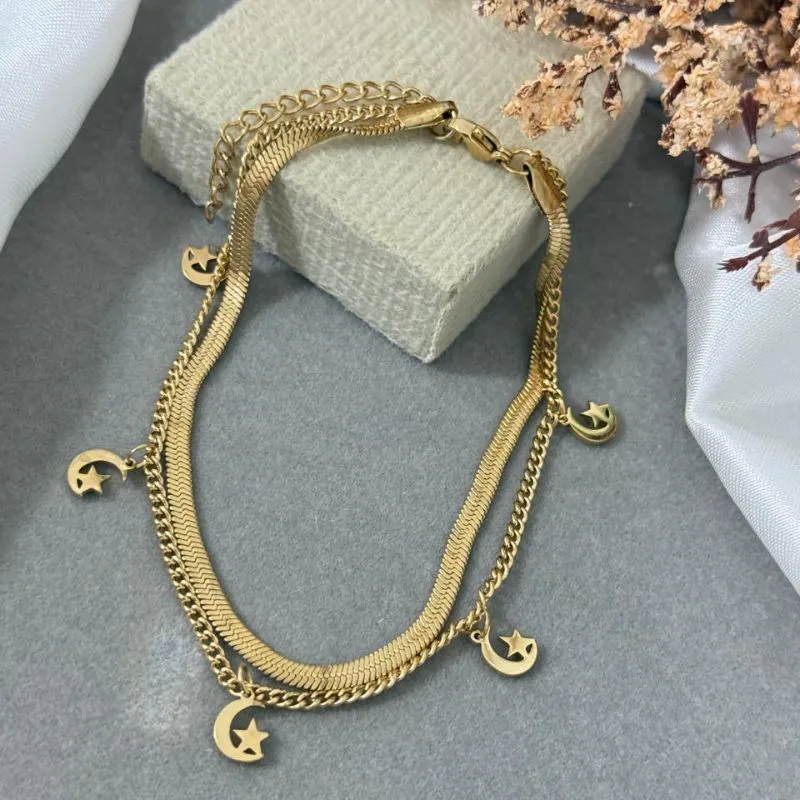 Tornozeleira dupla de aço com pingente