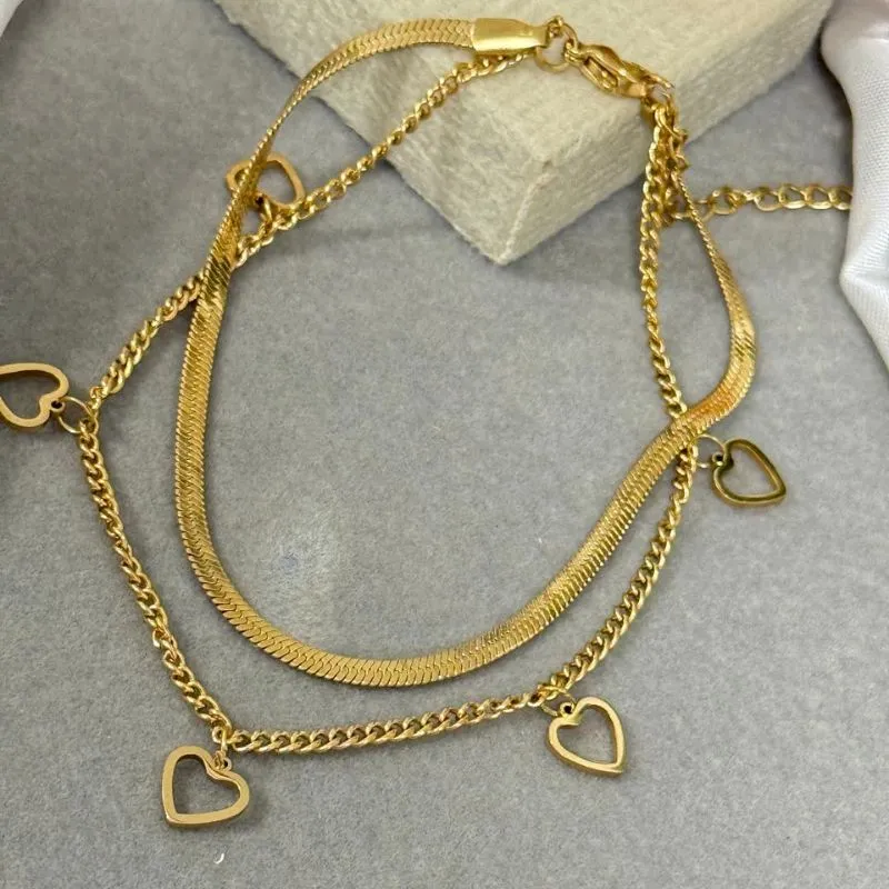 Tornozeleira dupla de aço com pingente coração vazado