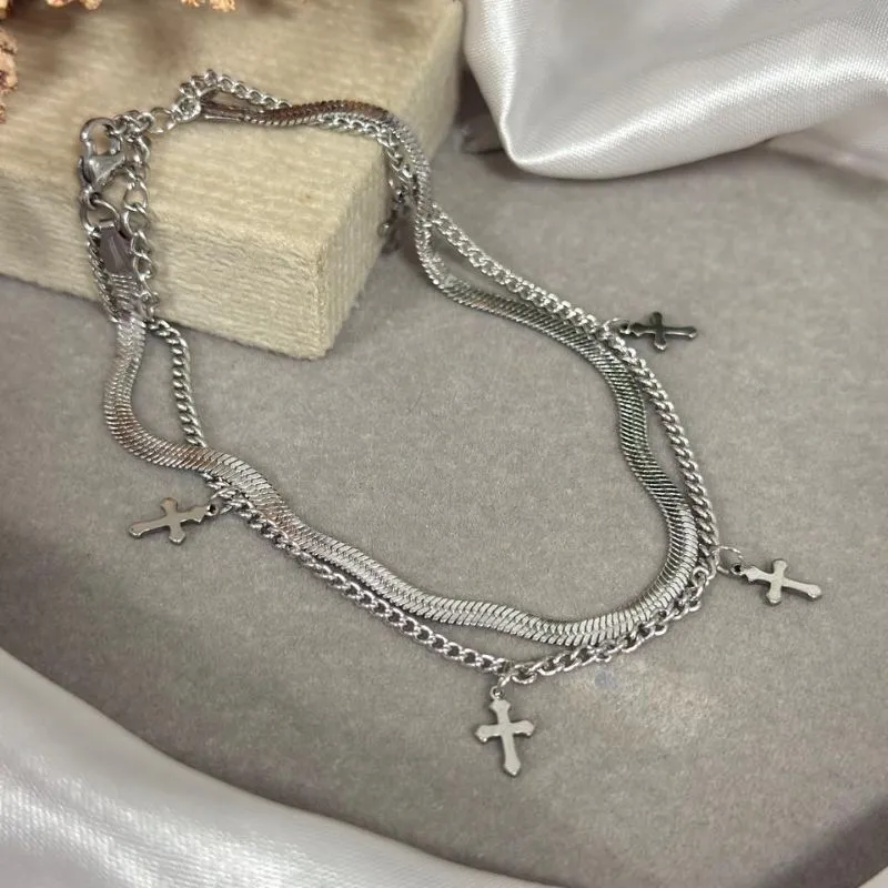 Tornozeleira dupla de aço com pingente cruz